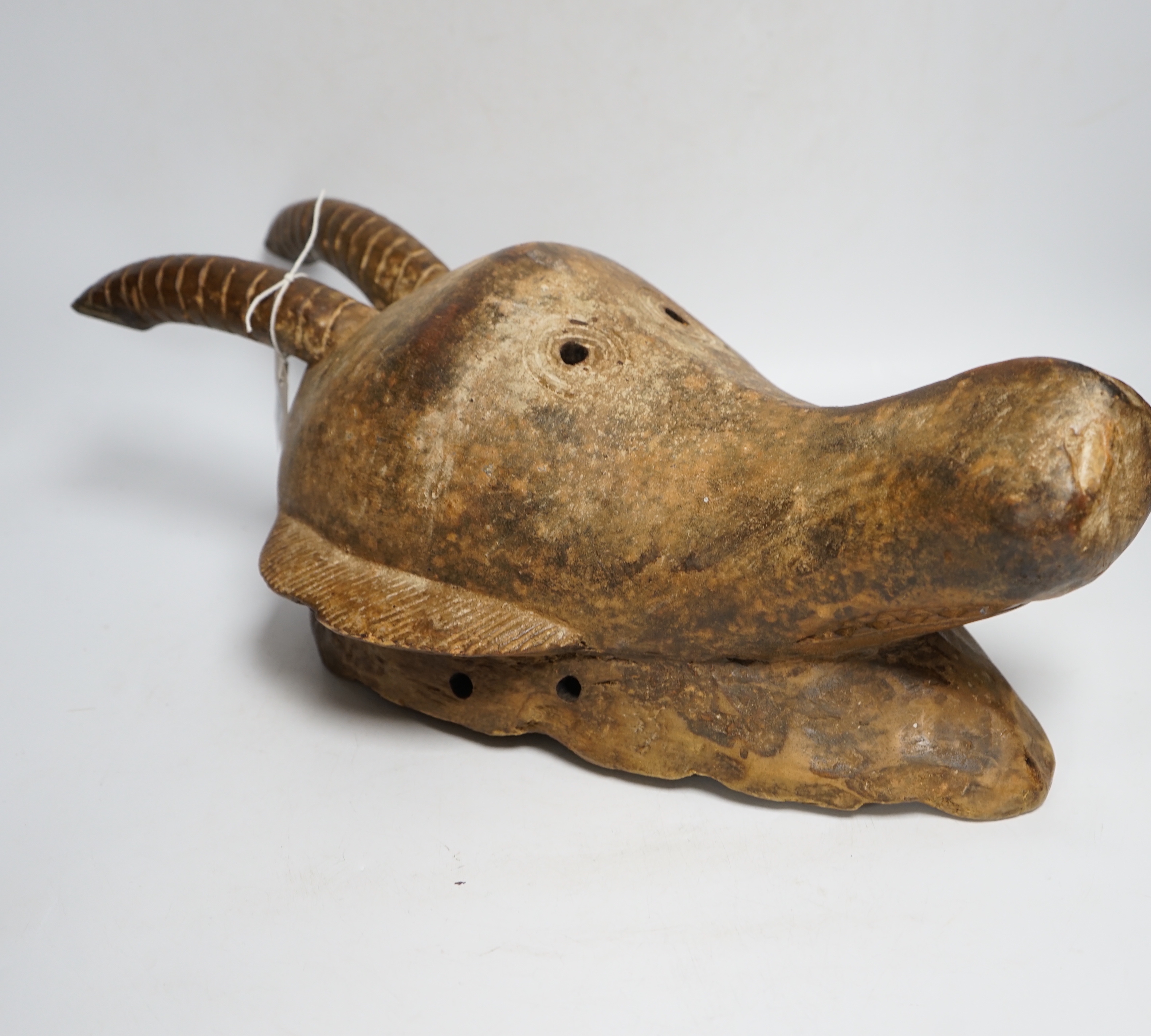 A carved wood antelope head mask, Burkina Faso?